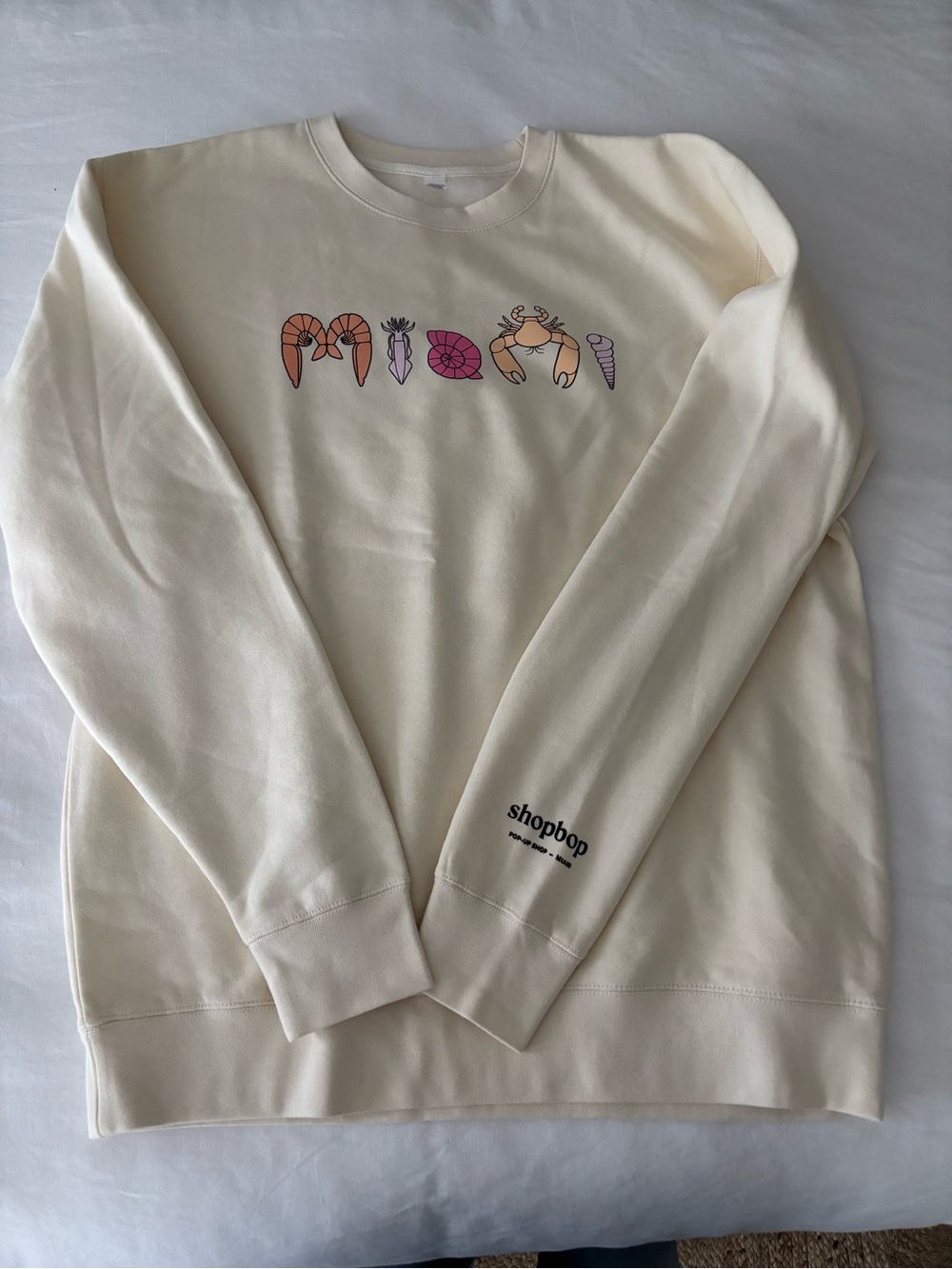 Shopbop Butter Yellow Graphic Crewneck Sweatshirt from the Miami pop-up